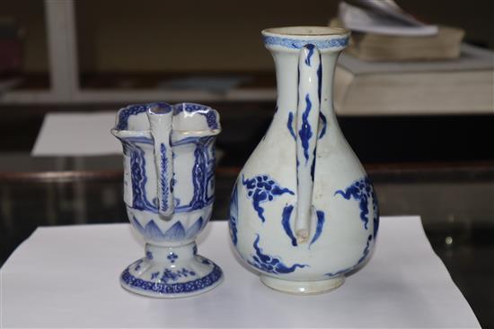 A Chinese Kangxi period blue and white wine pot and a Qianlong period helmet shaped milk jug Height of pot 16cm